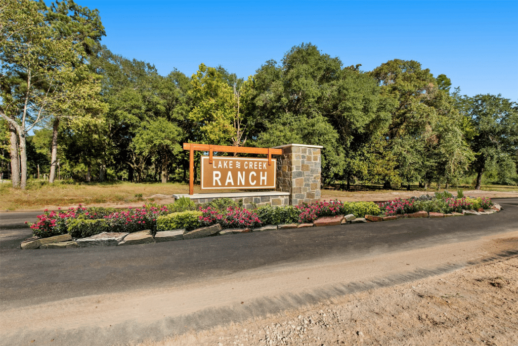 Sign welcoming residents and guests to Lake Creek Ranch, a new community in Montgomery, TX.