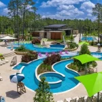 Resort-style pool and lazy river at The Woodlands Hills amenity center in Montgomery County, TX